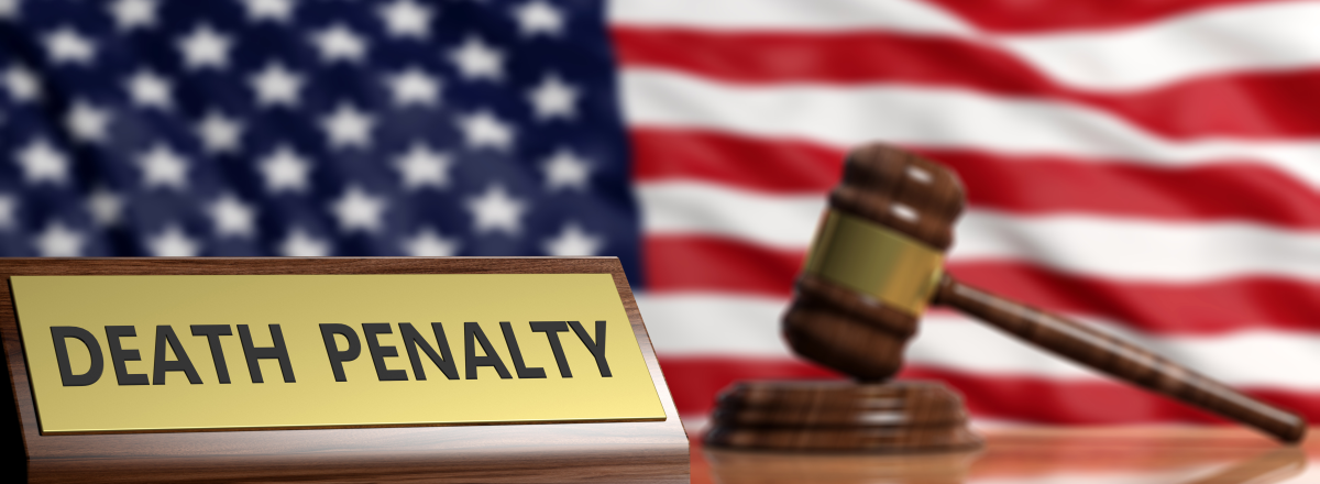 Image of the United States Flag behind a gavel and death penalty sign.